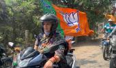 Bengal polls: Smriti Irani leads BJP rally on scooter