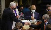 PIX: Fist bumps greet US Congress ratifying Biden win