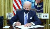 Biden signs executive actions on COVID, climate change