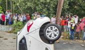 PIX: Car swallowed by Delhi road in monsoon