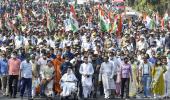 'Injured tiger' Mamata leads roadshow on wheelchair