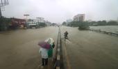 Storm crosses TN coast, 14 killed in heavy rains