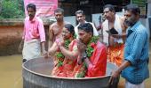 Kerala: Couple reaches wedding hall in cooking vessel