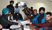 Sidhu files nomination, dares Majithia, Amarinder