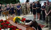 A Mother And Wife Weep For A Life Lost