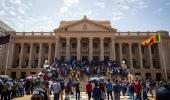 Lankan protesters withdrawing from official buildings