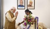 Modi, Nadda visit Murmu's home to greet her on win