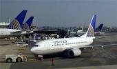 Man opens plane emergency exit, walks on wing in US