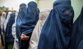 Taliban order women to cover up head to toe