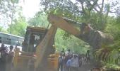 Day after, bulldozers in Delhi's New Friends Colony