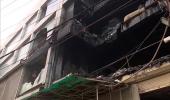 Delhi fire: Kin of victims look for loved ones