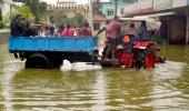 In waterlogged B'luru, techies ride tractors to office