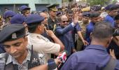 Will root out mobocracy: WB guv visits riot-hit Rishra