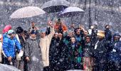 PIX: Oppn show of strength amid snowfall in Kashmir