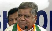 Shettar won't remove photos of Modi, Shah from office