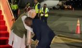 PM of Papua New Guinea touches Modi's feet on arrival