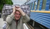 Ukrainians Flee To Escape Death