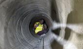 Trapped workers lifted rat miners on their shoulders