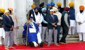 Sukhbir Badal performs 'sewadar' duty at Golden Temple