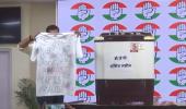 Displaying washing machine, Cong taunts BJP over...