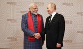 Modi Stands Out In A Room Of Suits