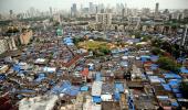 Maha govt okays 255 acre for slum rehab, names Adani