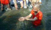 UP Ministers Takes Dip In Triveni Sangam