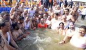 Yogi holds cabinet meet at Maha Kumbh, takes holy dip