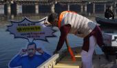 BJP leader immerses Kejriwal's effigy in Yamuna