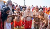 Shah takes holy dip in Triveni Sangam at Maha Kumbh