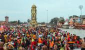 Collecting Water From The Ganga