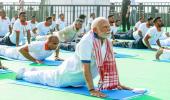 Twist and bend: Modi performs yoga from Vizag beach