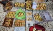 LIVE! DRI, ATS seize 100 kg gold, cash from Ahmedabad flat 