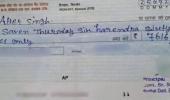 Teacher suspended after picture of cheque with spelling errors goes viral