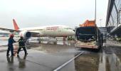 Bus, metres away from AI plane, catches fire at Delhi airport