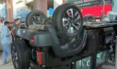 Woman drives Thar through 1st floor showroom, crashlands