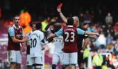 Carroll controversially sent off as West Ham thump Swansea