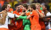 PHOTOS: Super-sub Krul puts Dutch into semis