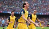 Atletico win La Liga title after draw at Barca