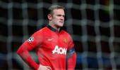 England's Rooney signs new long-term United deal