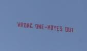 PHOTOS: Anti-Moyes banner flown over Old Trafford