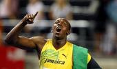 Bolt wins 200m gold with World record