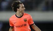 Henry, Ibrahimovic help Barca scrape past Xerez