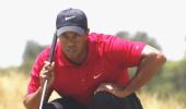 Woods taking break from golf, admits infidelity