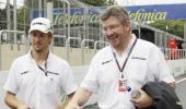 Your future is with us, Brawn tells Button