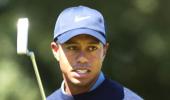 Woods 'unavailable' for questioning on car crash