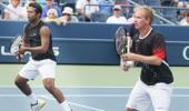 Paes survives tough test