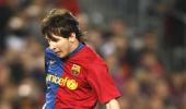 Messi double helps Barcelona rout Atletico