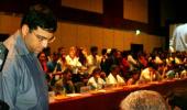 Anand beats 39 chess wizards amid nationality row