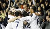 Crouch hat-trick gives Tottenham Champions League berth